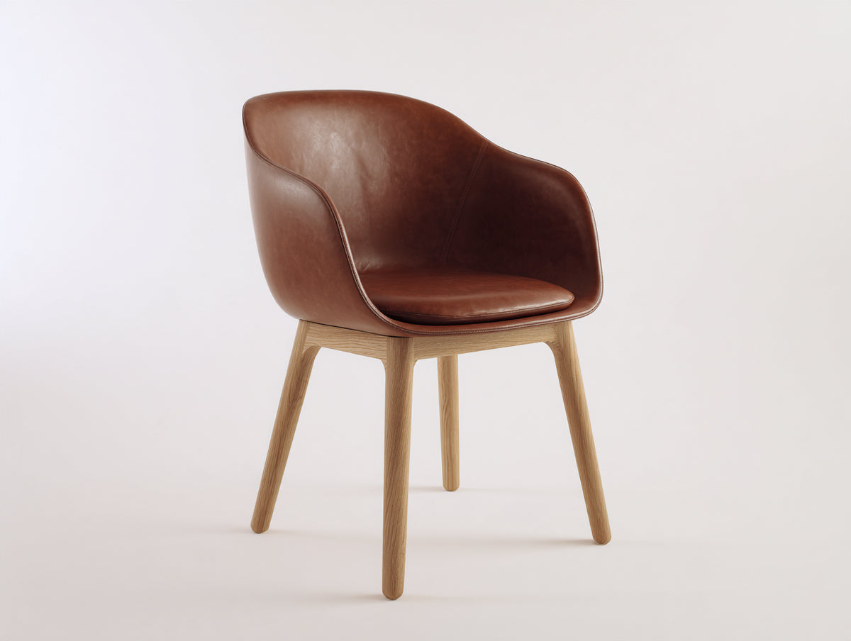 Silla de comedor tapizada en cuero sintético 62x60x82 cm - marrón coñac y roble natural - diseño moderno con respaldo envolvente